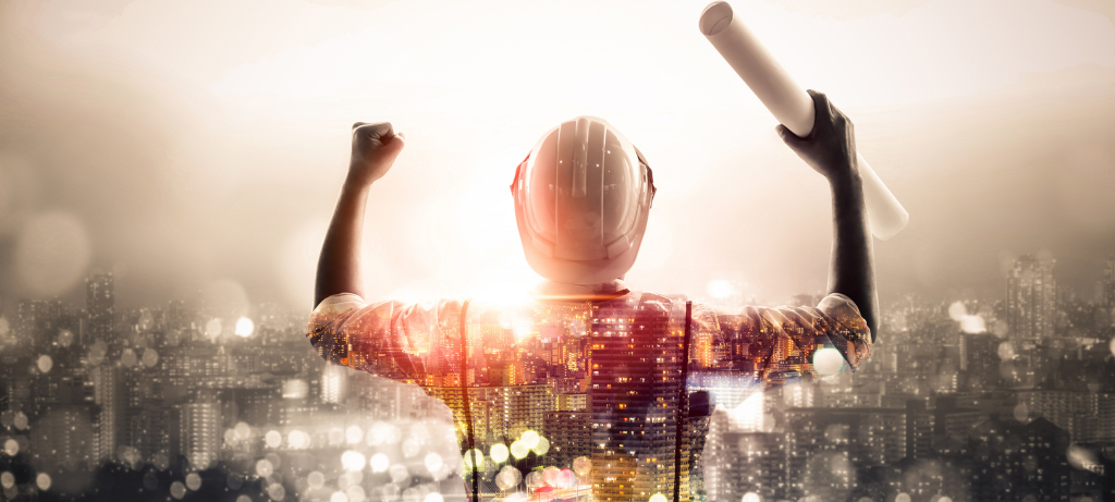 Image of construction worker with hands in the air