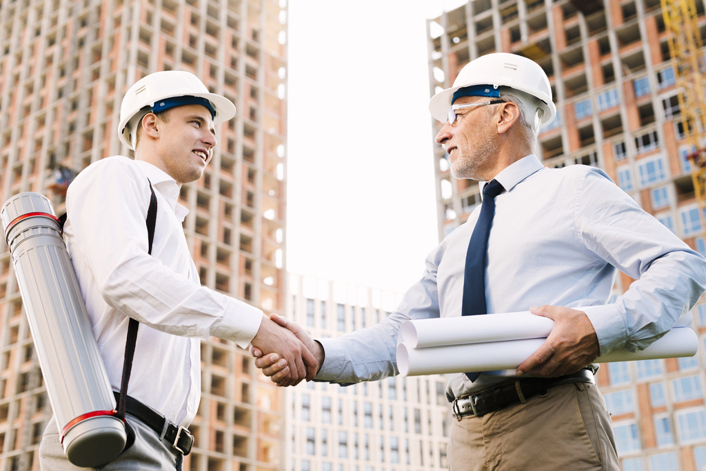 An image of construction Managers shaking hands