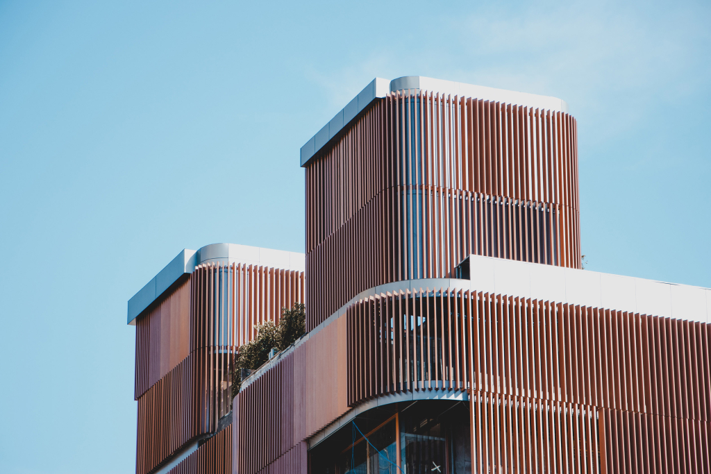 A photo of a curved architecturally designed building