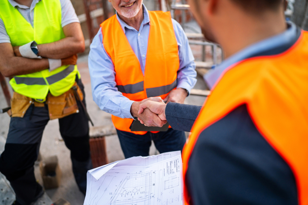 Image of developer and builder shaking hands over a successful collaboration