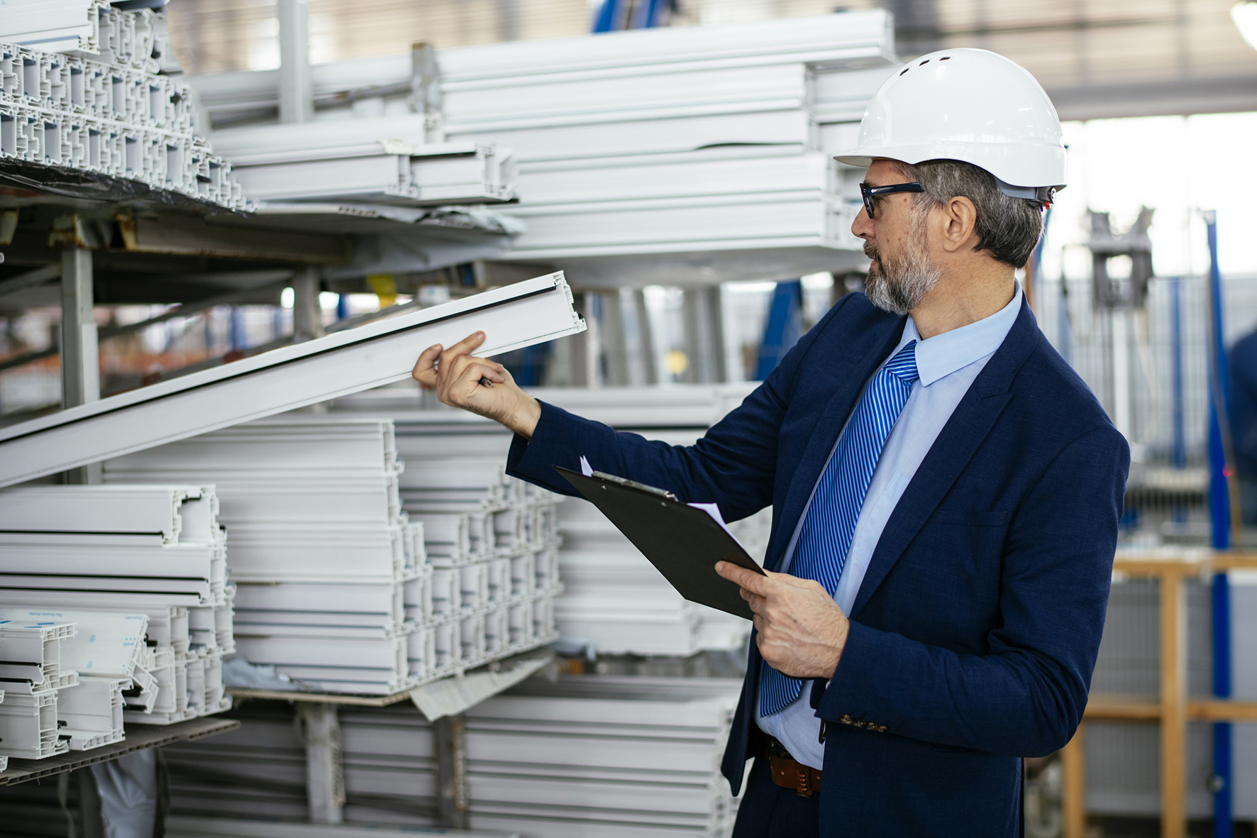 Construction Project Manager checking material quality