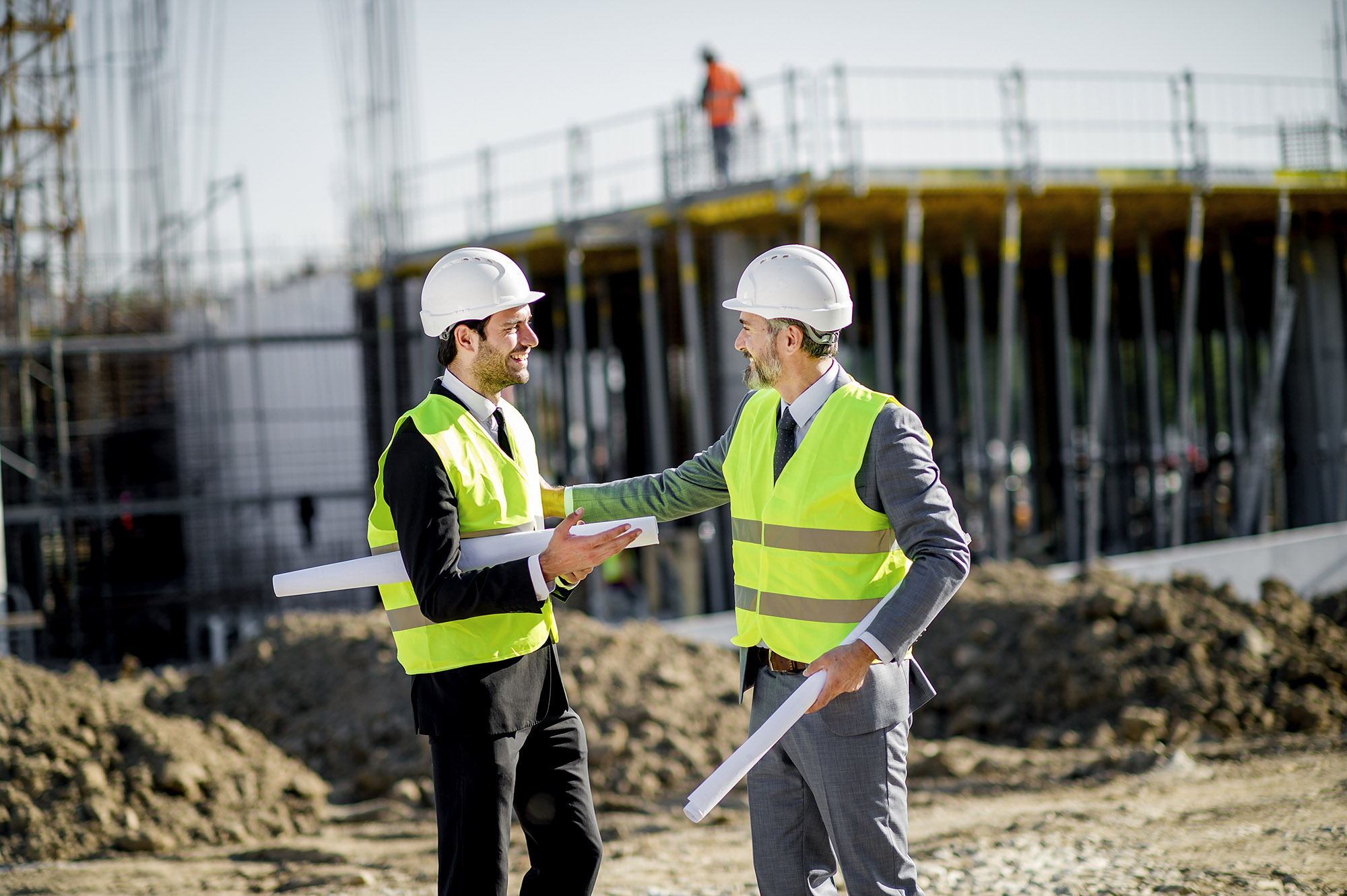 Multi-residential Builder Procurement - Developer and builder shaking hands